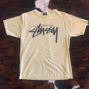 Pale yellow stussy logo t-shirt